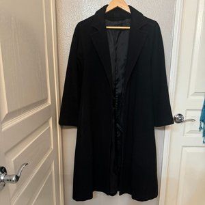 Black womens cashmere mid length coat.